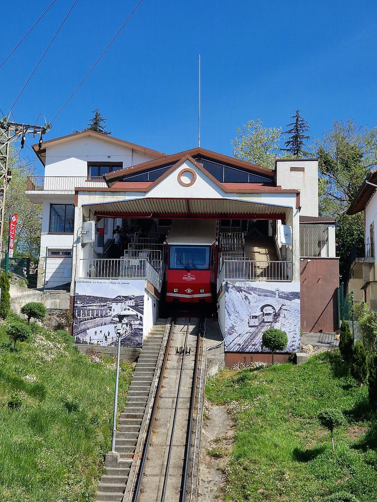 The upper funicular station on Artxanda, a car arriving up the steep track