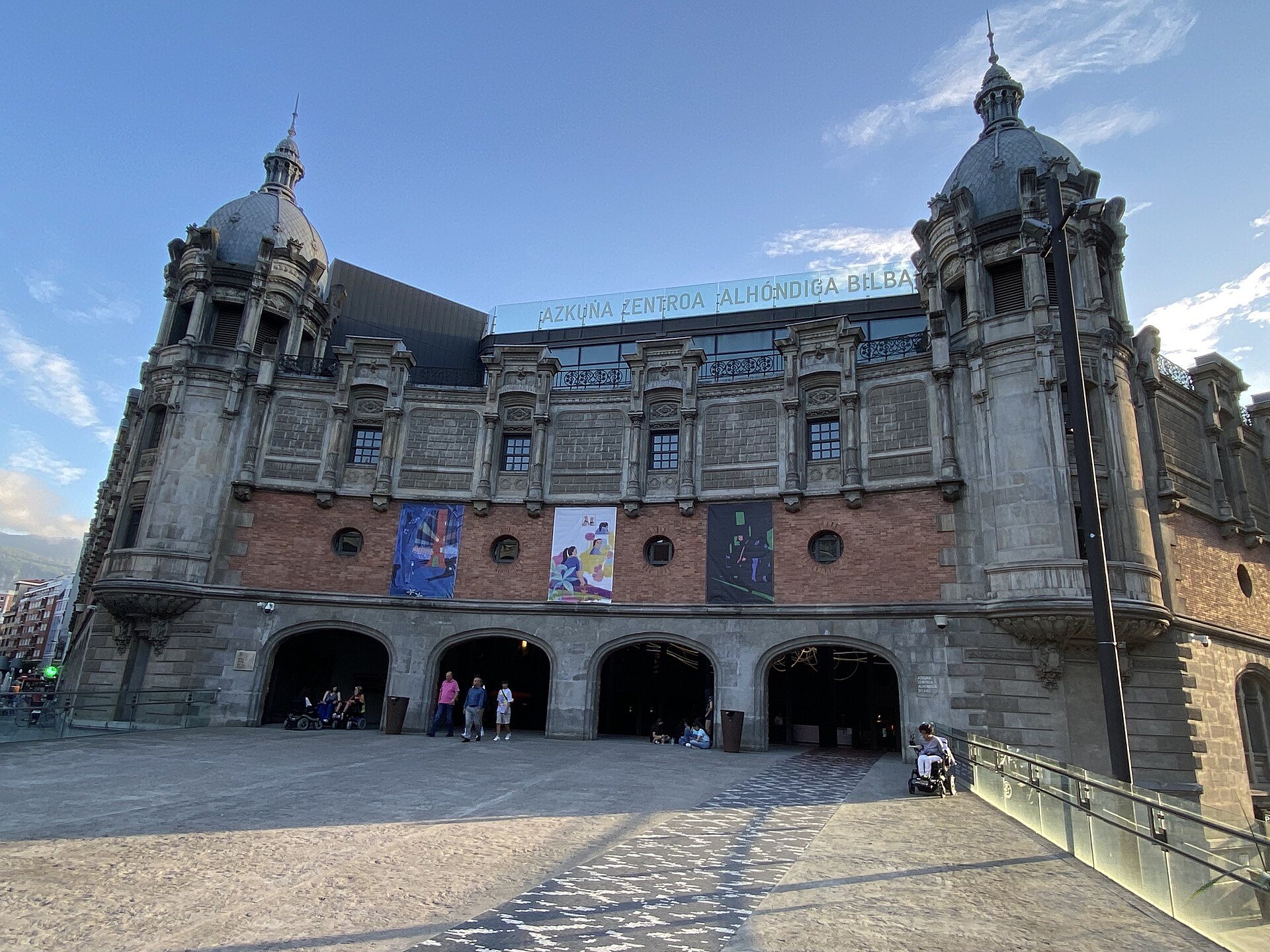 The old wine warehouse of Azkuna Zentroa, its corner towers and arched entrances