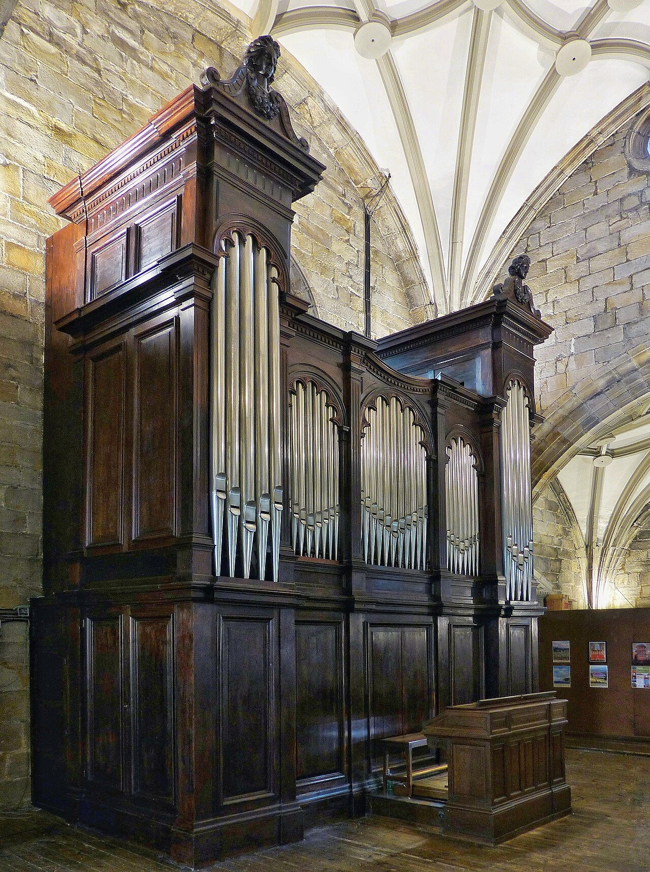 The great carved wooden case of the organ inside the Basilica of Begoña