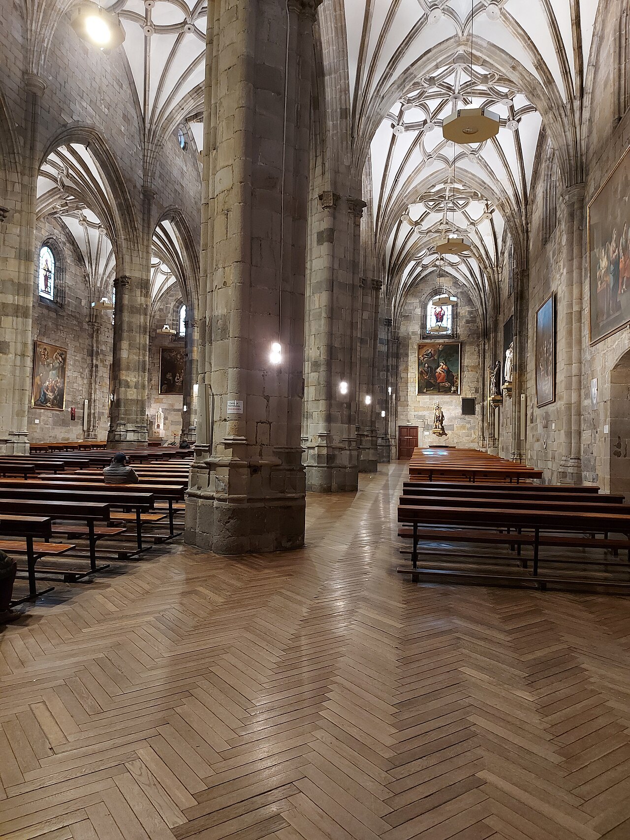 The long nave of the Basilica of Begoña with its ribbed vaults