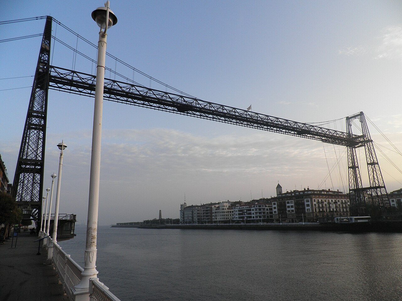 The Bizkaia Bridge from Portugalete in the evening, its girder across the river mouth