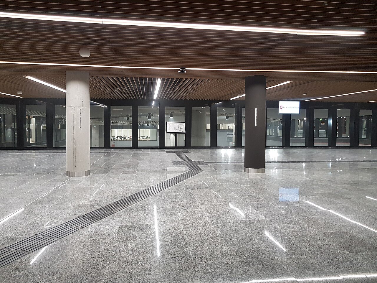 The bright underground concourse of the Intermodal bus station