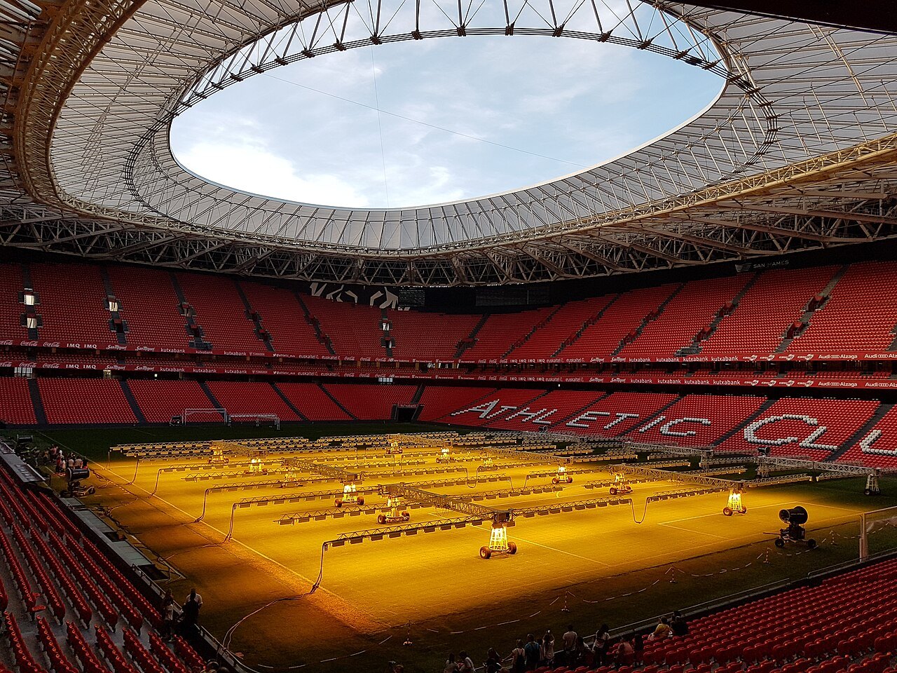 The lit pitch of San Mamés under its open roof, the club name on the stands