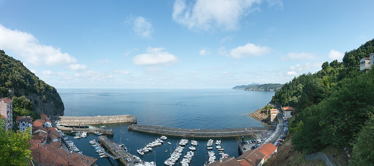 The little harbor of Elantxobe on the Urdaibai coast, the bay beyond