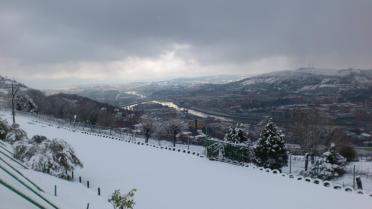 Snow on the hills above Bilbao, the city in the valley beyond