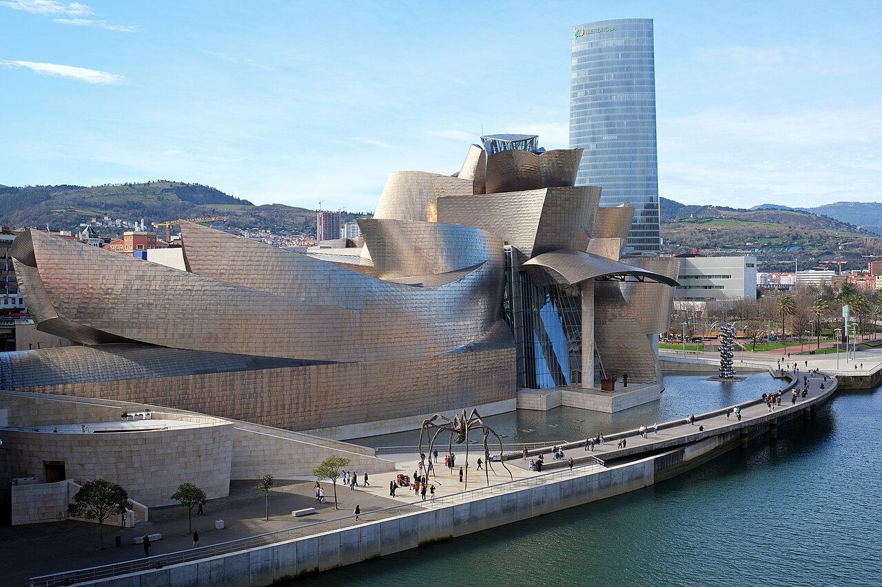 The Guggenheim on the left bank, with the Iberdrola Tower behind it