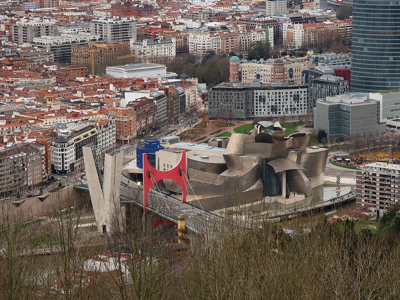 The Guggenheim, La Salve bridge and the Abandoibarra towers seen from the hillside above