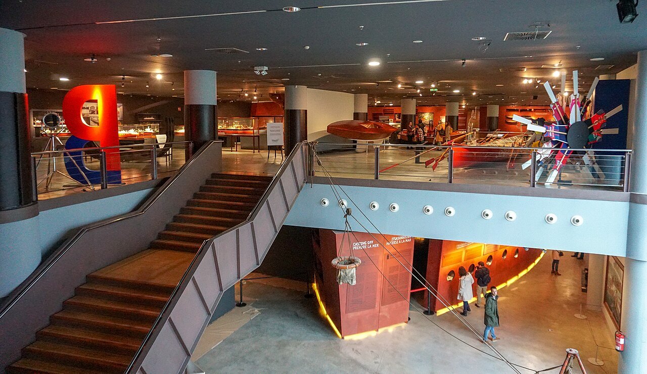 The main hall of the Itsasmuseum, stairs leading to the galleries