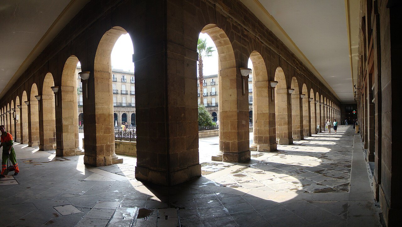 Looking out of the Plaza Nueva's arcades into the square