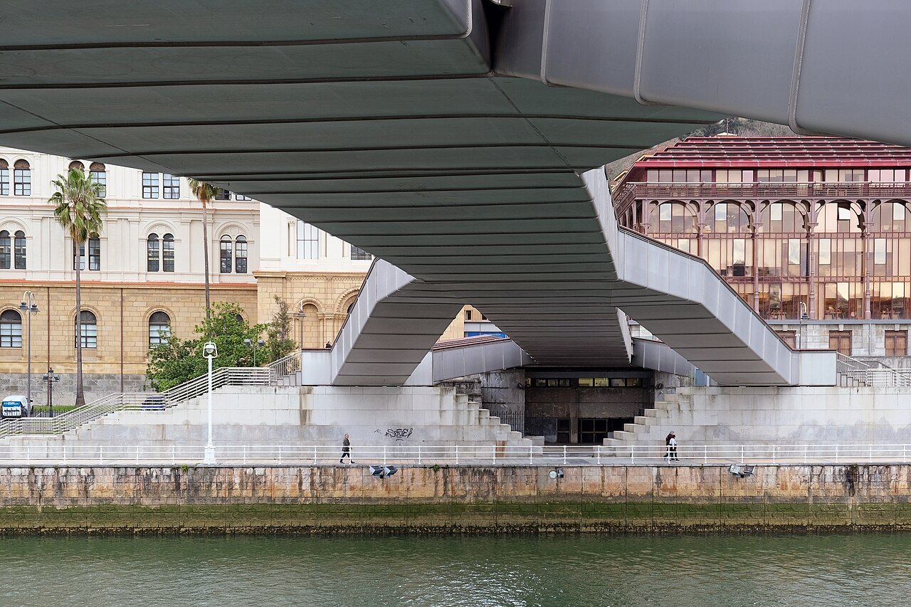 Under the Pedro Arrupe footbridge, the University of Deusto across the river