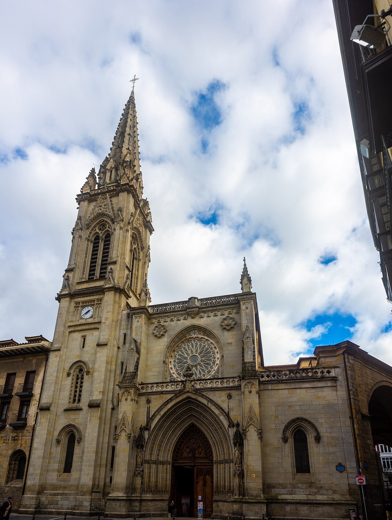 Santiago Cathedral's west front and spire, closing a lane of the Casco Viejo