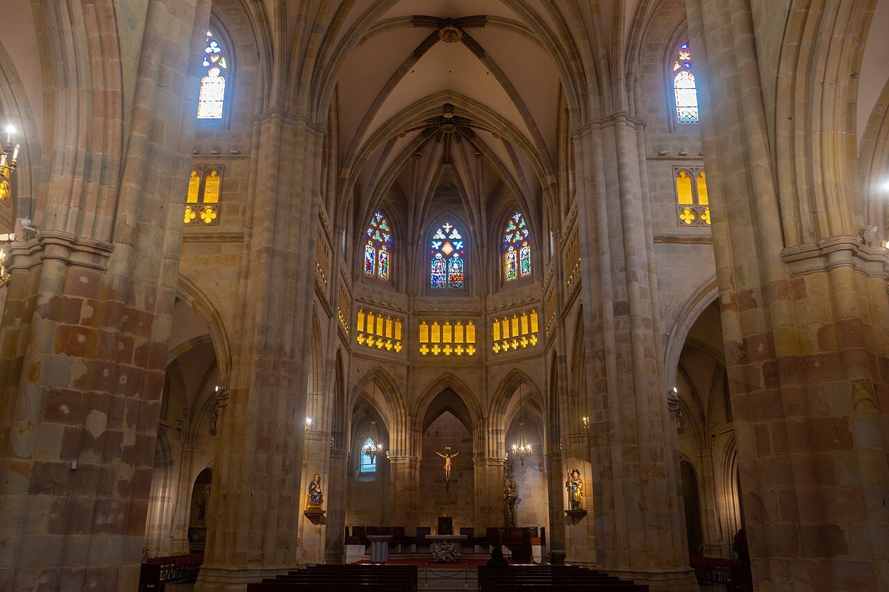 The Gothic nave and lit apse of the cathedral of Santiago