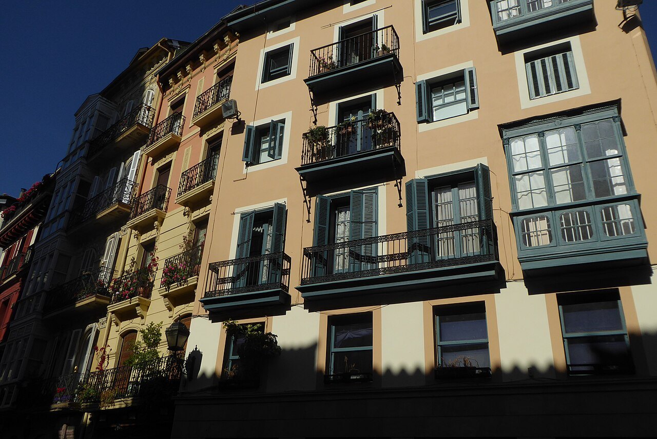 Glazed balconies on the houses around the Plaza de Santiago